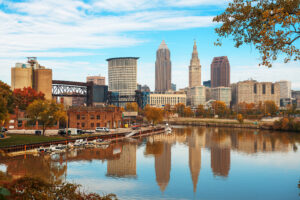 Cleveland, Ohio, USA skyline on the Cuyahoga River in autumn.