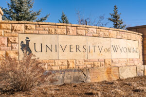 Laramie, WY - December 5, 2020: Stone University of Wyoming sign outside of the university campus in Laramie